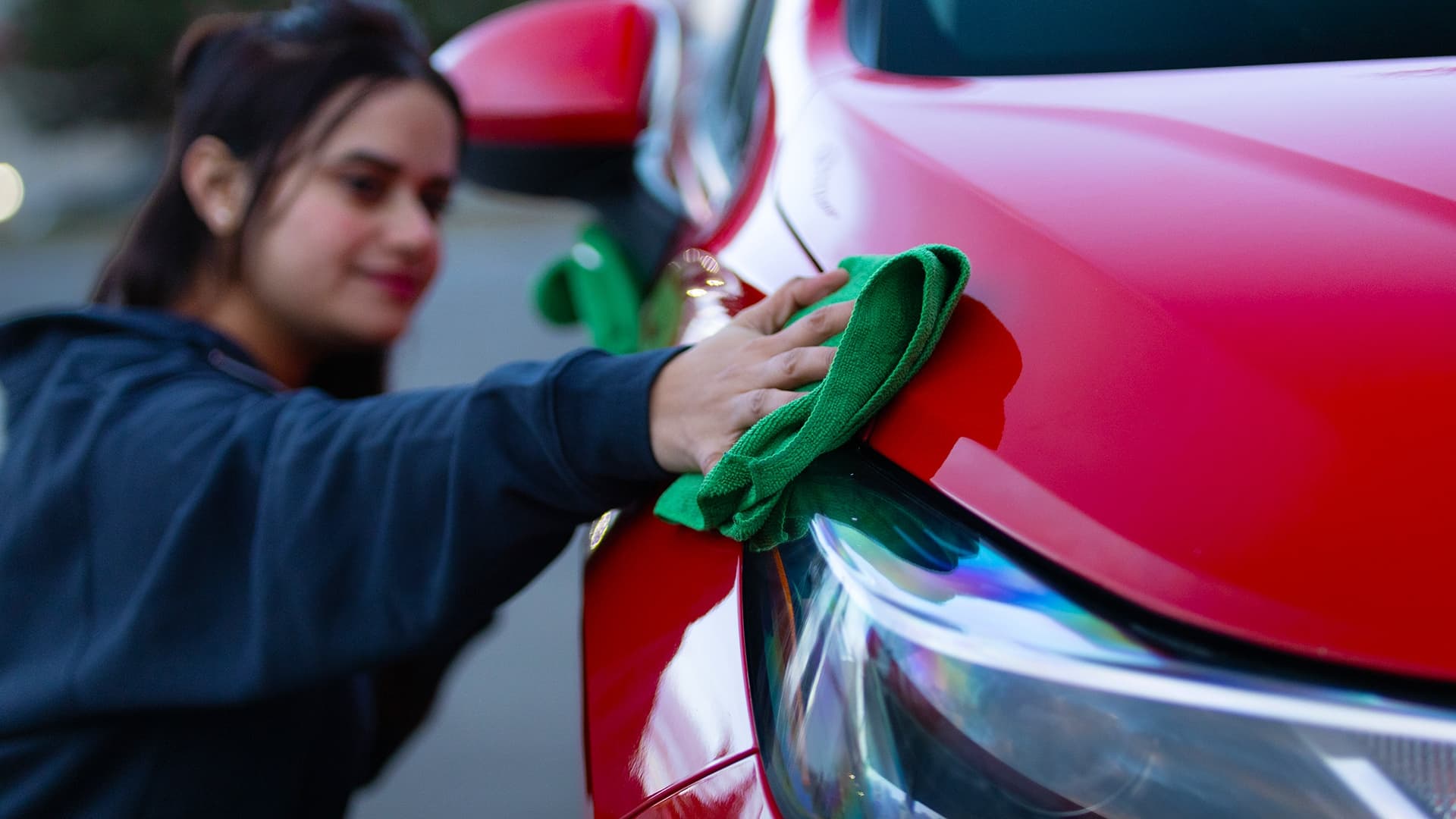 Valet Technician detailing red car